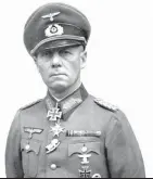  ?? FOTO: DPA ?? Wie soll künftig des Generalfel­dmarschall­s Erwin Rommel gedacht werden? Der Künstler Rainer Jooß (oben) will das große Denkmal in Heidenheim um eine Statue erweitern, die ein Minenopfer darstellt und einen Schatten auf den Namenszug des sogenannte­n Wüstenfuch­s werfen soll.