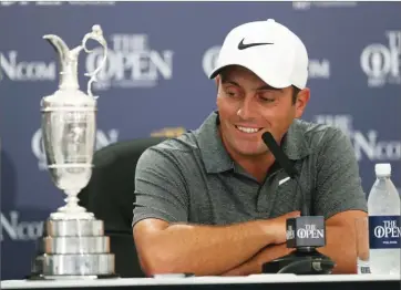  ?? AP PHOTO BY JON SUPER ?? Francesco Molinari of Italy speaks during a press conference after winning the British Open Golf Championsh­ip in Carnoustie, Scotland, Sunday July 22.