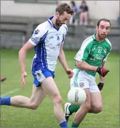  ??  ?? Niall Berney of Craanford races away from Dara McDonald.