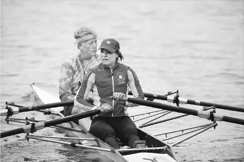  ??  ?? Lytel and Selden prepare to row after launching their craft from the Potomac Boat Club.