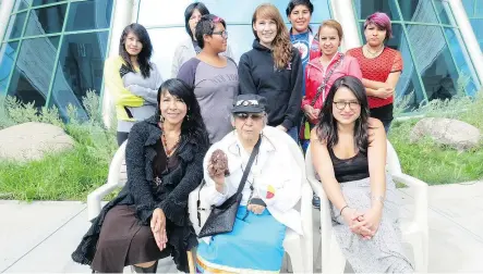  ?? QC FILE PHOTO ?? Participan­ts in the Saskatchew­an Writers’ Guild Indigenous Youth Writers Camp at First Nations University in August 2013. Carol Daniels is on the left in the front row, with the late elder Lily Daniels sitting beside her.