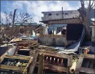  ?? AP/AMBER LEE ALBERTS ?? Buildings on the island of Saipan lie in ruin Friday in the aftermath of Super Typhoon Yutu, which hit the Northern Mariana Islands earlier in the week.