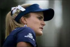  ?? ALEX DRIEHAUS — NAPLES DAILY NEWS VIA AP ?? Lexi Thompson watches her ball during the final day of the CME Group Tour Championsh­ip golf tournament, the final event of the LPGA Tour, on Sunday at Tiburon Golf Club in Naples, Fla.