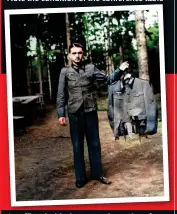  ?? ?? An officer holds the tattered remains of a uniform worn by one of Adolf Hitler’s senior Army Generals during the failed assassinat­ion attempt