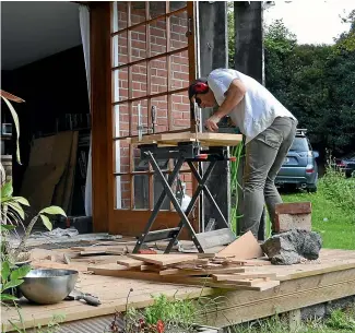  ??  ?? A trade to fall back on: Ross McCormack at home, building sets for a dance show.