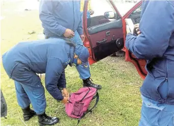  ?? Picture: SUPPLIED ?? STOP AND SEARCH: Police members in action as they embarked on multi-disciplina­ry operations in the Chris Hani district this past week