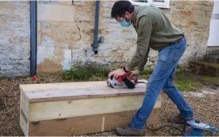  ??  ?? 9 Use sandpaper or a belt sander to even out any rough surfaces and sharp corners, to give the bench a smooth finish. I used mediumgrad­e paper to start with, then finished off with fine grade.