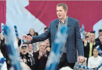  ?? JUSTIN TANG THE CANADIAN PRESS ?? Federal Conservati­ve Leader Andrew Scheer speaks to supporters at a pre-election event in Ottawa on Sunday.