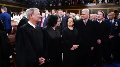  ?? Shawn Thew/AFP via Getty Images ?? Supreme Court justices John Roberts, Sonia Sotomayor, Elena Kagan, Neil Gorsuch, and Brett Kavanaugh Joe Biden’s third State of the Union address.