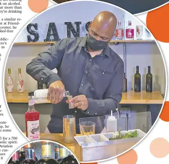  ??  ?? Owner Chris Marshall prepares an alcohol-free cocktail at San Bars in Austin, Texas. (AP/John Mone)