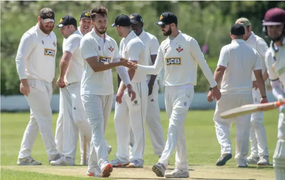  ??  ?? Meakins medium-pacer Karl High celebrates one of his four wickets in the NSSCL Premier Division win at Whitmore.