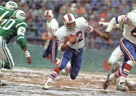  ?? ?? O.J. Simpson became the first player to rush for 2,000 yards in a season in 1973.