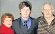  ??  ?? HAPPY FAMILY: Dwayne and his parents, Cheryl and Ernst