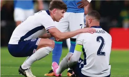  ?? ?? Kyle Walker (right) suffered a hamstring injury against Brazil, while John Stones (left) was injured against Belgium. Photograph: Marc Atkins/Getty Images