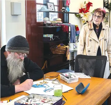  ??  ?? Art is coming back to life as Trafalgar Railway Station Artspaces gallery manager Sue Murphy and drawing teacher Dale Plew welcome visitors back to the Baw Baw Arts Alliance galleries in Trafalgar and Warragul.