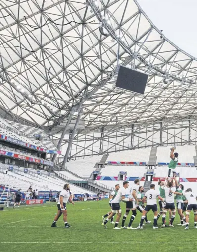  ?? ?? Scotland players take part in a training session at the Velodrome in Marseille as they prepare for tomorrow’s World Cup Pool B clash with South Africa. Above left, captain Jamie Ritchie says the game is not something to be feared
