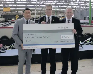  ??  ?? Cheque that From left, Jim Gillespie, chi ef executive of Kibble Education and Care Centre; John Macleod, Lord Dean of Guild and Paul Martin, chief executive of the Merchants House of Glasgow