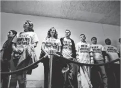  ?? AP ?? Immigratio­n advocates gather outside the Senate Judiciary Committee room on Capitol Hill. Lockstep Republican talking points are starting to crumble.