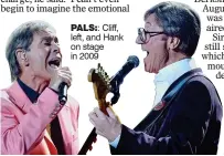  ??  ?? PALS:: Cliff, left, and Hank on stage in 2009