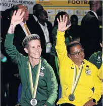  ?? /GALLO IMAGES ?? Banyana skipper Janine van Wyk and coach Desiree Ellis wave to the OR Tambo crowd.