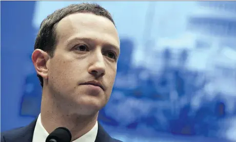  ?? SAUL LOEB/AFP/GETTY IMAGES ?? Facebook CEO Mark Zuckerberg testifies during a congressio­nal hearing April 11, in the wake of the Cambridge Analytica data breach. Facebook has been preparing for Europe’s General Data Protection Regulation, which puts citizens’ rights ahead of...