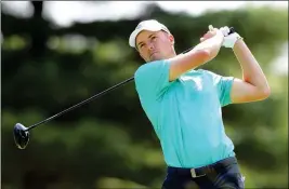  ?? ASSOCIATED PRESS ?? JORDAN SPIETH TEES off on the the tenth hole during the first round of the Dell Technologi­es Championsh­ip golf tournament at TPC Boston in Norton, Mass., Friday.