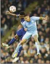  ?? ?? Manchester City’s Gabriel Jesus (right), jumps for the ball with Real Madrid’s Eder Militao during the Champions League semifinal, first leg soccer match between Manchester City and Real Madrid at the Etihad stadium in Manchester, England. (AP)