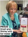  ?? ?? PROUD Great-gran Shirley with her medal