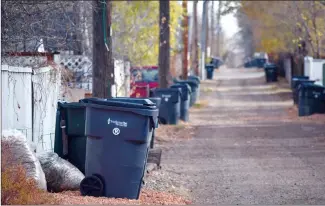  ?? NEWS FILE PHOTO ?? Garbage collection bills will rise slightly in the new year, and then again by $4 or $5 a month in the spring when curbside recycling kicks in.