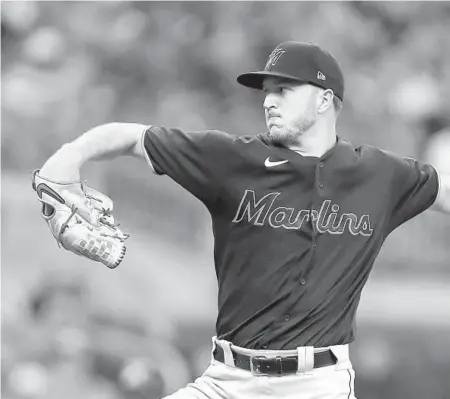  ?? BEN MARGOT/AP ?? Miami Marlins pitcher Trevor Rogers works against the Atlanta Braves during the first inning of their game Friday in Atlanta.