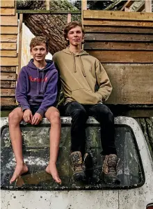  ?? JOSH POOTS ?? Sam and Ben Cruickshan­k, pictured with mum Donna in Takapau in rural Hawke’s Bay, say they can’t cry at school because ‘‘crying in front of your friends is a bit of a weakness’’.
