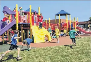  ?? FILE PHOTO ?? Students at Glen Stewart school get to play daily on their boundless playground, built on a wheelchair-accessible surface and includes specialize­d equipment for children with physical challenges. It includes elements for the visually and hearing...