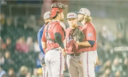  ?? CHERYL PURSELL PHOTOS ?? Michael Mariot hopes Major League Baseball will acknowledg­e what minor league players are saying in their surveys about the pitch clock and other rules that he believes are not good for the game.