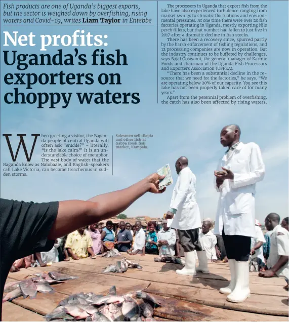  ??  ?? Salesmen sell tilapia and other fish at Gabba fresh fish market, Kampala.