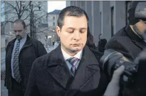  ?? CP PHOTO ?? Toronto police officer Const. James Forcillo, shown here shown leaving court in Toronto Jan. 25, 2016, has been arrested for allegedly breaching his bail conditions related to his house arrest.