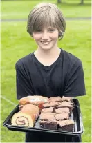  ??  ?? Celebrator­y cake Remy McDonald with some of the cakes baked by her brother Max for the last session