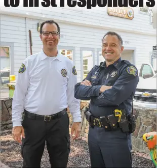  ?? Shelly Thorene
/ Union Democrat ?? Sonora Police Chiefturu Vanderwiel (right) on Wednesday stands with Sonora Police Department Chaplain Randy Ehle, 57, in Grigsby Park at the police department.