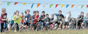  ?? CATHIE COWARD THE HAMILTON SPECTATOR FILE PHOTO ?? Grade 4 boys leave the start line during the Catholic elementary schools cross country meet at Camp Marydale in 2017. These are tough days for the Catholic Youth Organizati­on.