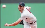  ?? WINSLOW TOWNSON/AP PHOTO ?? Chris Sale of the Red Sox delivers a pitch in the first inning of Sunday’s game against the Mariners at Boston.