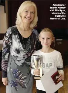  ??  ?? Adjudicato­r Niamh Murray with Ella Ryan, winner of the Pat Byrne Memorial Cup.