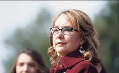  ?? Joshua Roberts / Getty Images ?? Former U.S. Rep. Gabby Giffords listens as Democratic lawmakers speak in support of gun background check legislatio­n on Capitol Hill in Washington, D.C., on on Feb. 26, 2019.