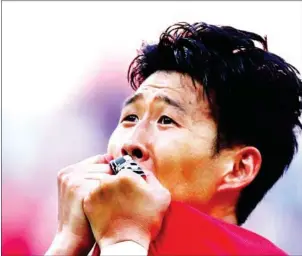  ?? AFP ?? South Korea forward Son Heung-min celebrates scoring against Germany in their Russia 2018 World Cup Group F match at the Kazan Arena on June 27.