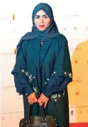  ??  ?? Saudi actress producer Abir Al-Juleih poses for a picture upon arrival for the opening ceremony.