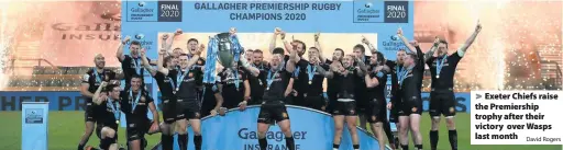  ?? David Rogers ?? Exeter Chiefs raise the Premiershi­p trophy after their victory over Wasps last month