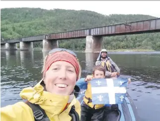  ??  ?? Magali Moffatt, Benoît Gendreau-Berthiaume and their son Mali on the Ottawa River, which straddles the Quebec and Ontario border.