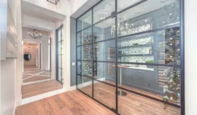  ?? COURTESY OF JOSHUA PETERS/LAUNCH REAL ESTATE ?? Oliver Ekman-Larsson’s $3.9 million mansion has a climate-controlled wine room.
