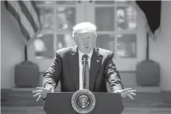  ?? AP Photo/ Andrew Harnik ?? President Donald Trump speaks about the U.S. role in the Paris climate change accord Thursday in the Rose Garden of the White House in Washington.