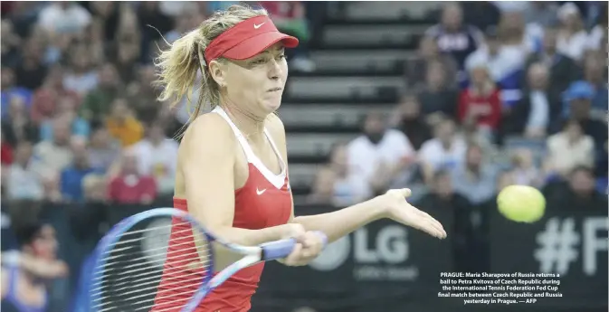  ??  ?? PRAGUE: PRAGUE: Maria Sharapova of Russia returns a ball to Petra Kvitova of Czech Republic during the Internatio­nal Tennis Federation Fed Cup final match between Czech Republic and Russia
yesterday in Prague. — AFP