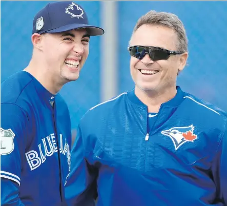  ?? NATHAN DENETTE/THE CANADIAN PRESS ?? Toronto Blue Jays manager John Gibbons, seen sharing a laugh with starting pitcher Aaron Sanchez at spring training in Dunedin, Fla., on Wednesday, says he has “no concerns” about Sanchez’s ability to start for a full season after last year’s campaign.