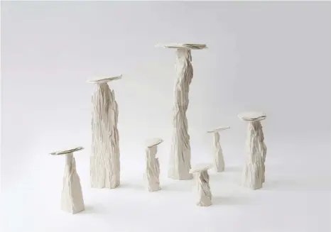 ??  ?? Crafted from tulip tree, plaster and oxide pigments, the Formation series of sculptural plinths was inspired by the eroded rock seen across Australia’s natural landscape